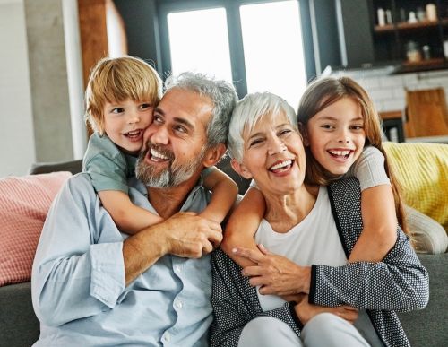 Portrait of grandparents and grandchildren having fun together - grandparent visitation rights concept